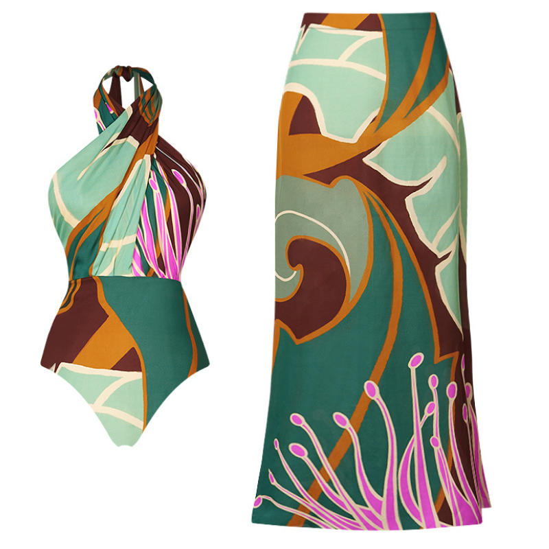 Maiô feminino com estampa abstrata em tons de verde, marrom e rosa, com faixa marcando a cintura, modelo sem alças com amarração no pescoço.