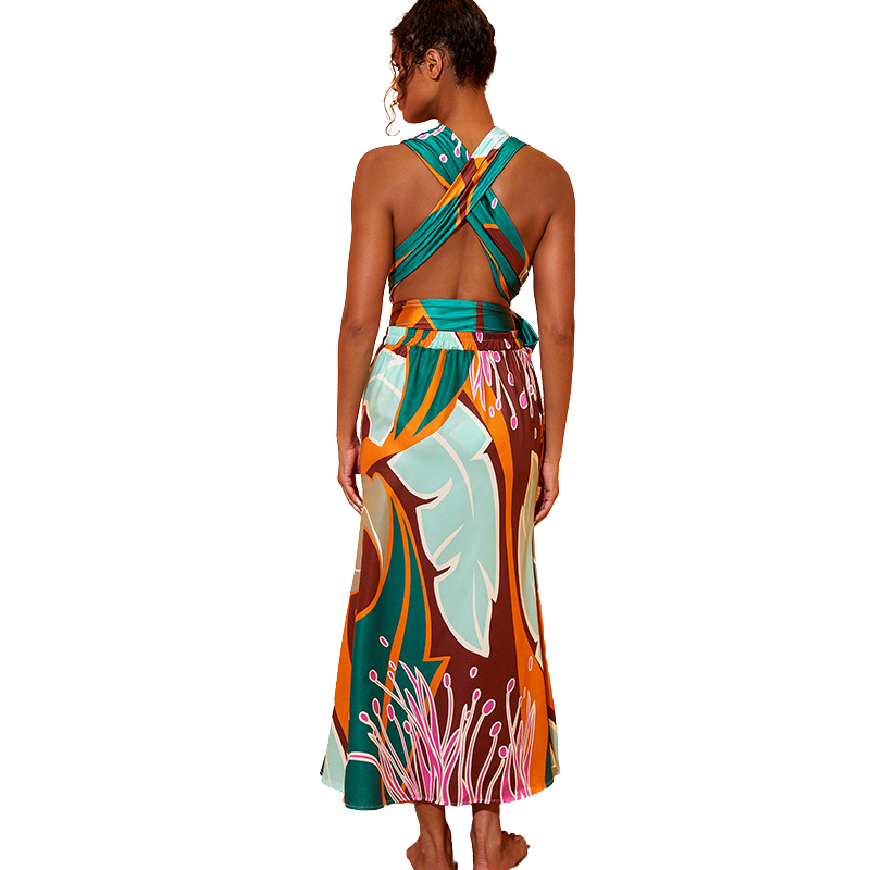 Maiô feminino e Saída de Praia com estampa abstrata em tons de verde, marrom e rosa, com faixa marcando a cintura..